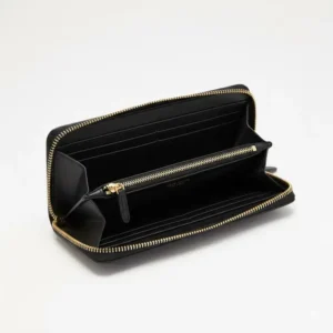 Illustration 1: Detailed interior view of the kate spade continental wallet showing card slots and bill compartments.