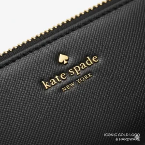 Illustration 7: Focus on the iconic gold-plated logo and high-quality zipper on a kate spade continental wallet.